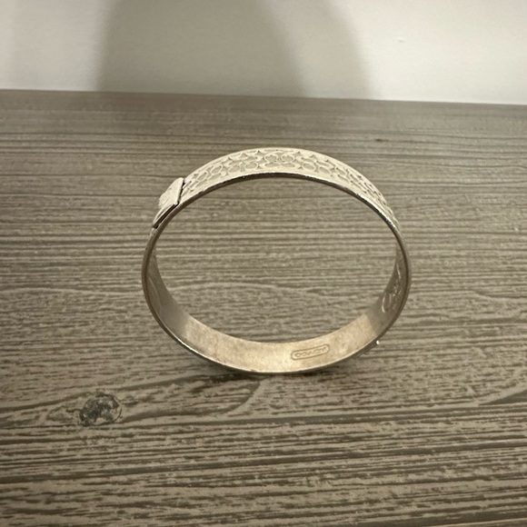 COACH Silver Bangle Bracelet with Signature Classic “C” Logo Print. - Picture 6 of 12